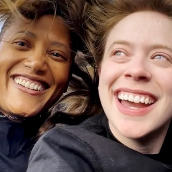 A photo of two space explorers. On the left, Sian H. Proctor. On the right, Hayley Arceneaux. Both are smiling