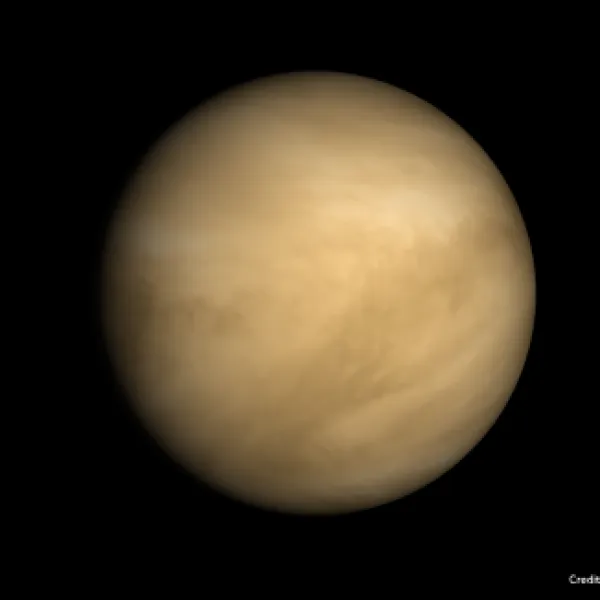 Planet Venus - swirling yellowish beige clouds cover the planet