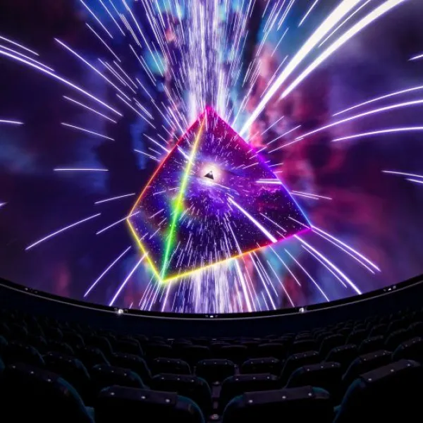 Promotional image of a dome screen showing Pink Floyd's Dark Side of the Moon Planetarium Show